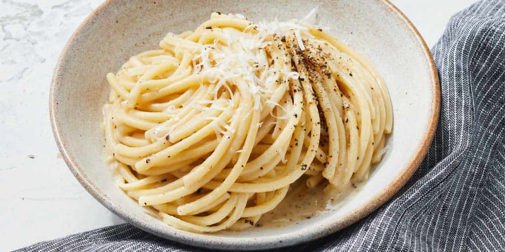 Authentic Roman cacio e pepe pasta dish with pecorino and pepper